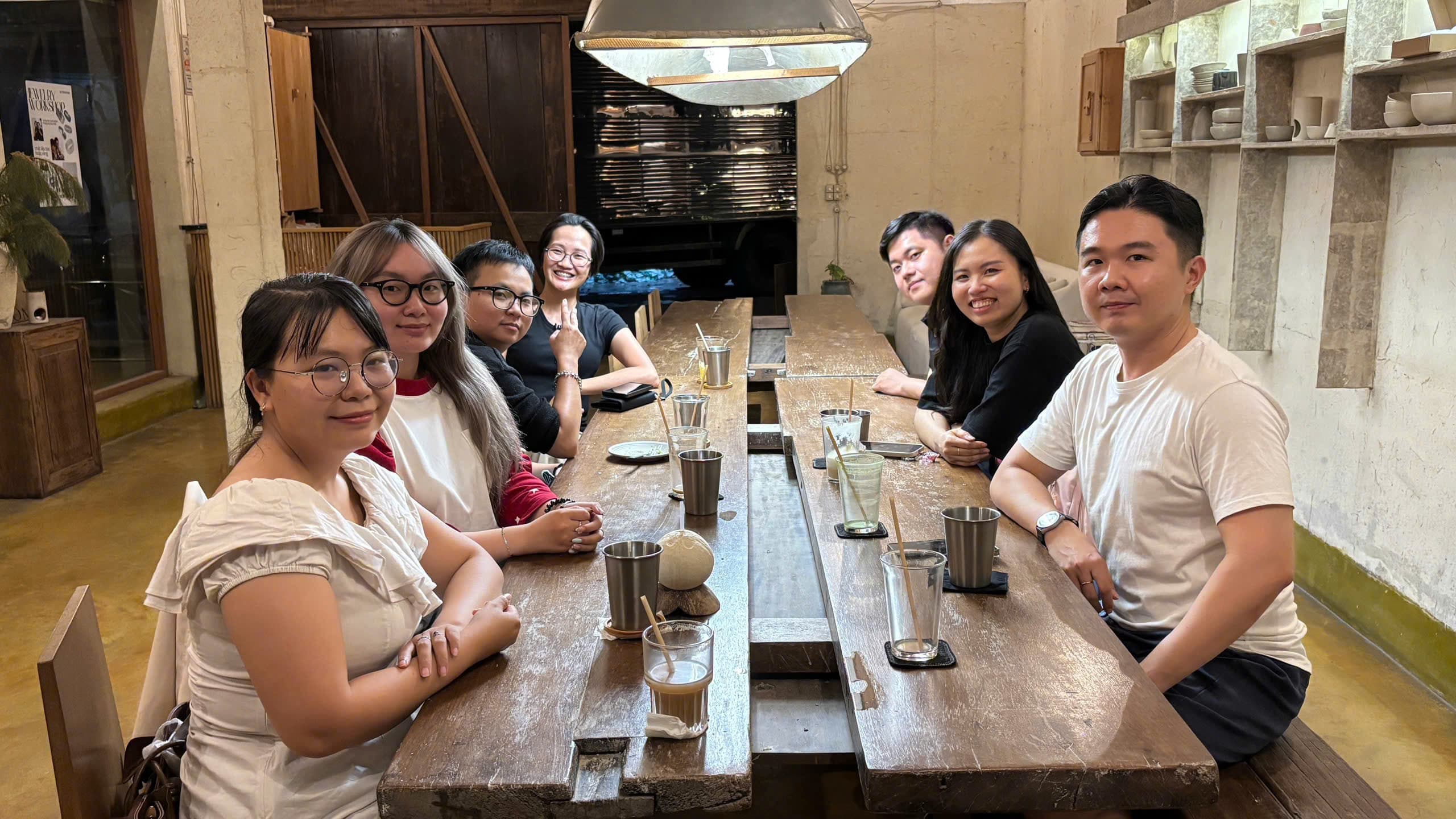 FIX team members gathering together around a table