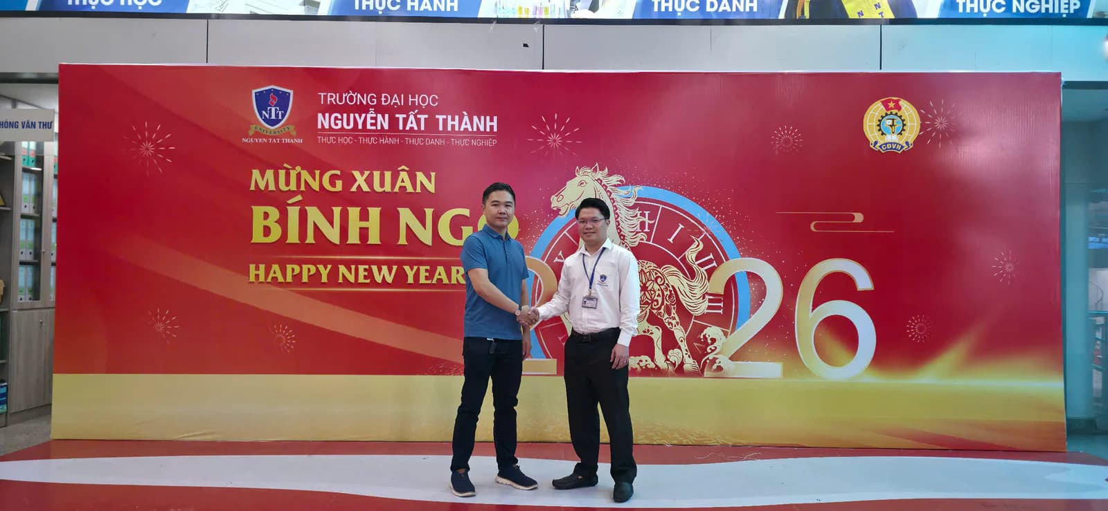 FIX Partner representative meeting with a Nguyen Tat Thanh University representative